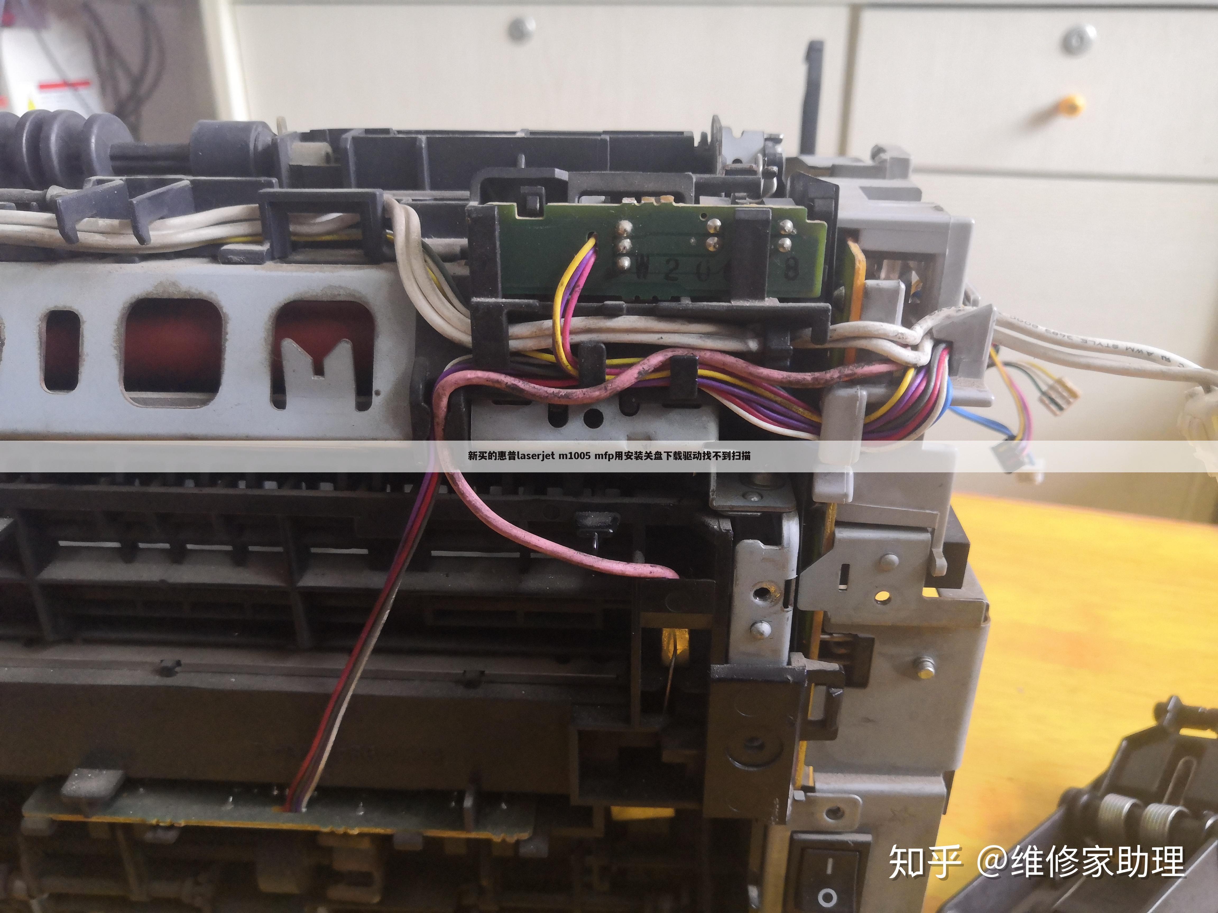 新买的惠普laserjet m1005 mfp用安装关盘下载驱动找不到扫描